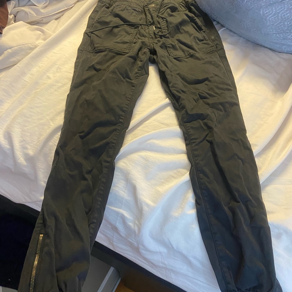 Black casual pant with zipper on ankle